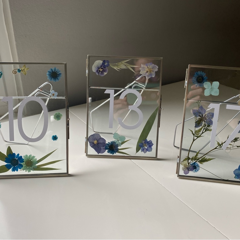 Wedding table numbers (1-17) with blue dried flowers